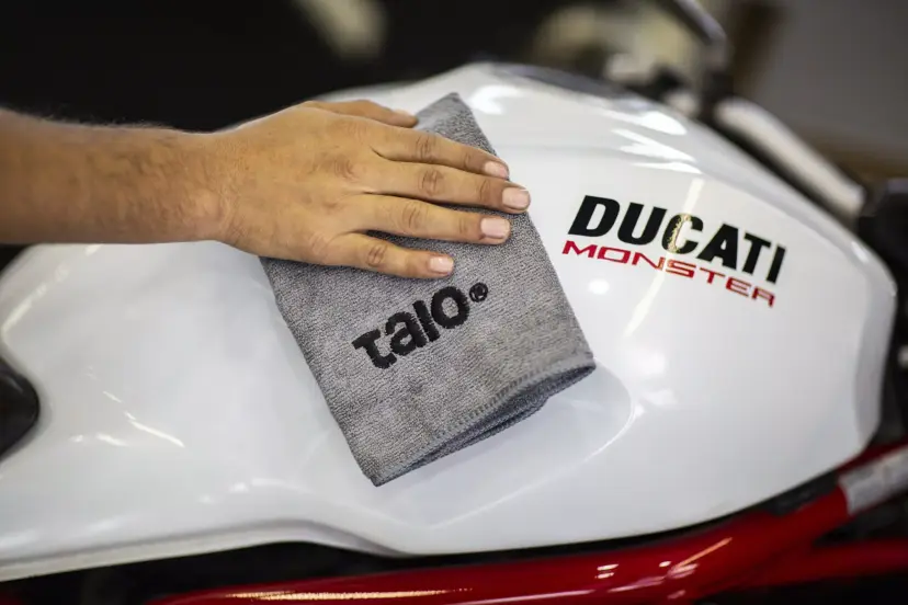 Talo Basic towel on a white Ducati tank