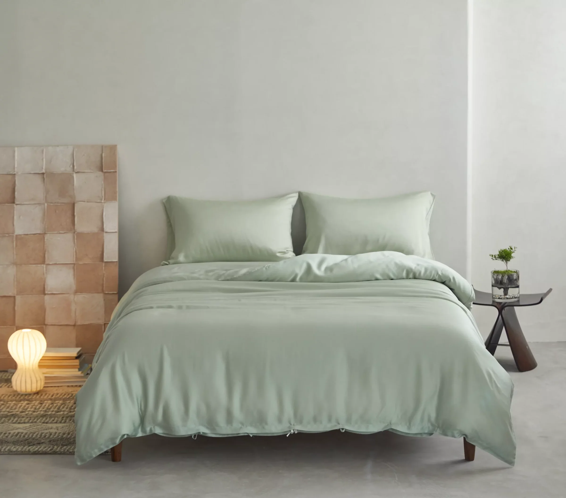 Shangrila sheets in sage on a made bed